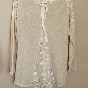 Long sleeve blouse with lacy accent and bow